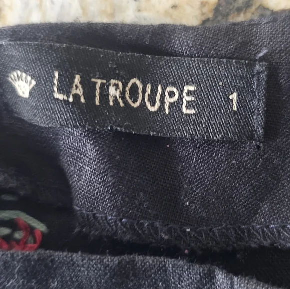 La Troupe black linen-style shorts featuring embroidered pink poppy Flowers - Picture 2 of 7